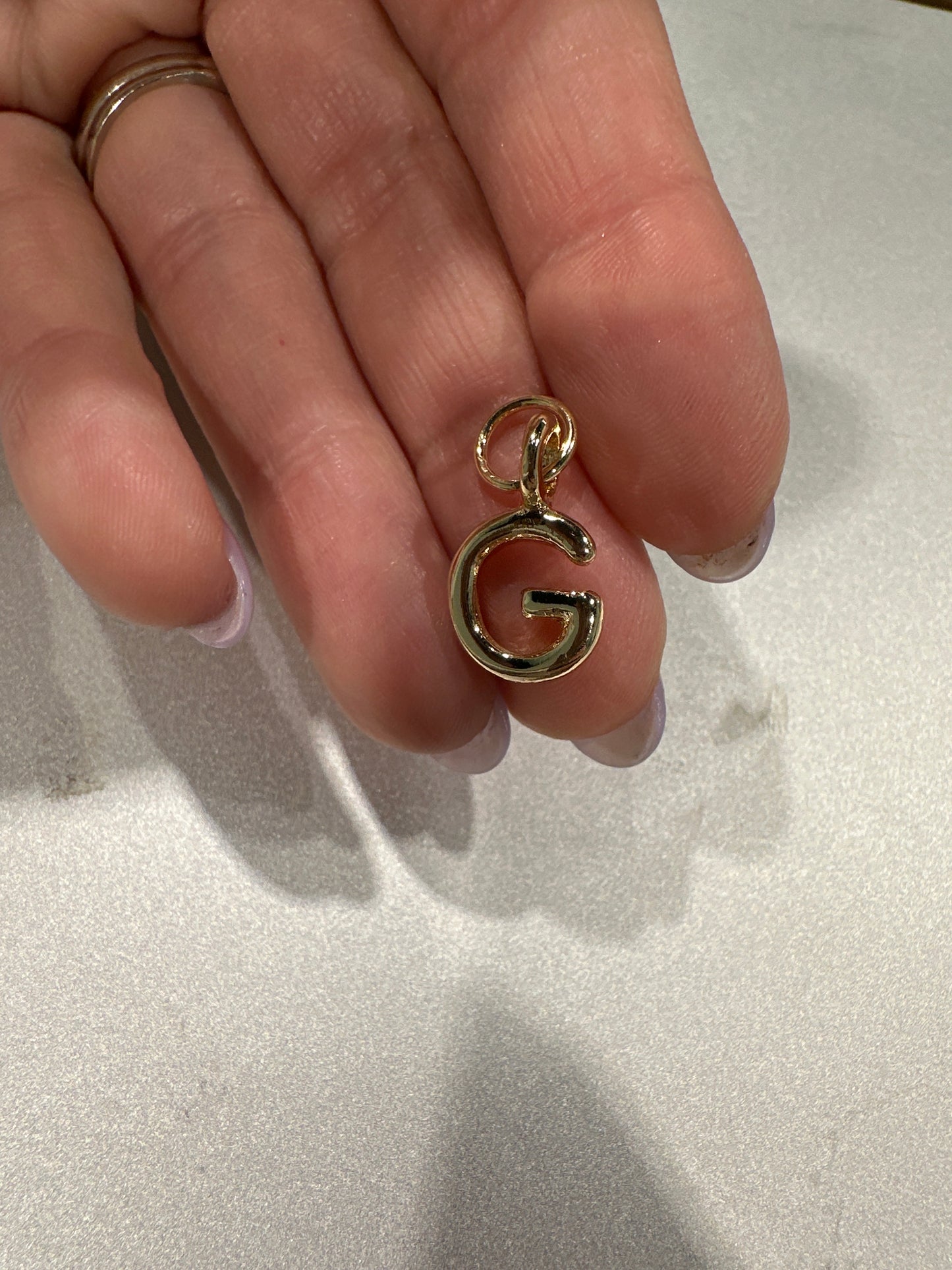 Mini Initial Charm in shiny gold