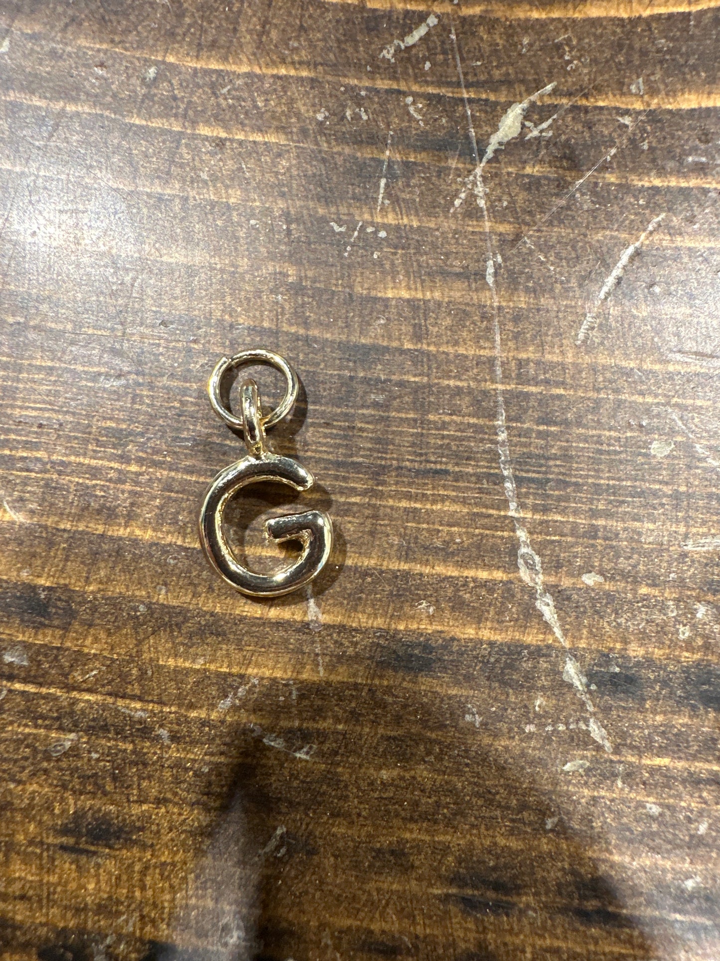 Mini Initial Charm in shiny gold