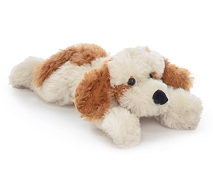 Stuffed lying puppy